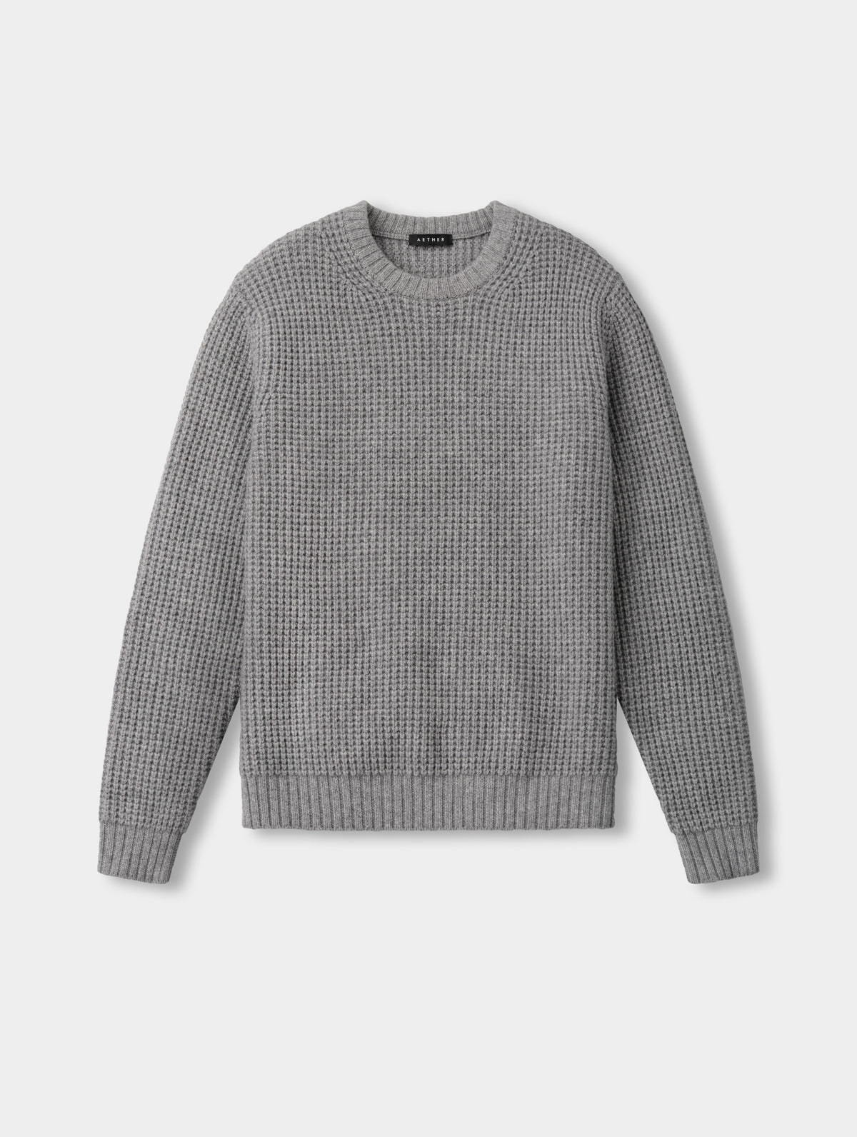 Flat lay of the Coastal Waffle Sweater in Heather Grey from AETHER Apparel.