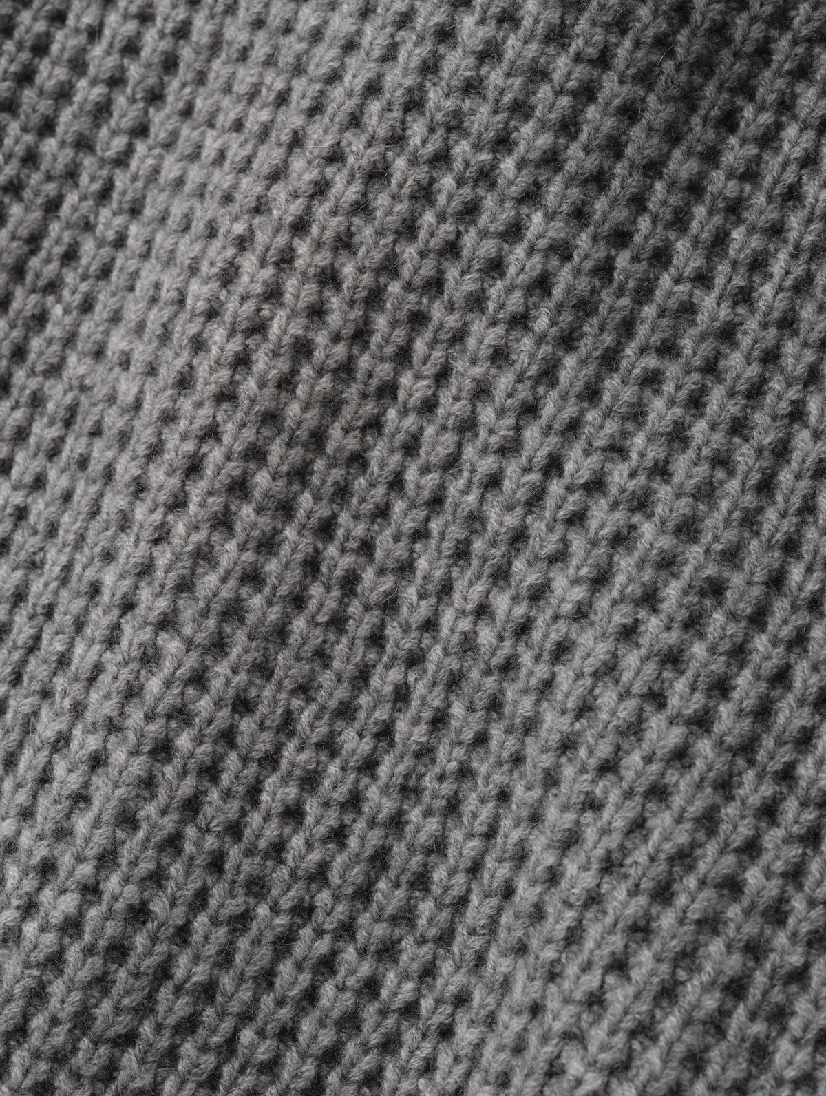 Closeup detailed view of the waffle stitch construction on the Coastal Waffle Sweater in Heather Grey from AETHER Apparel from AETHER Apparel.