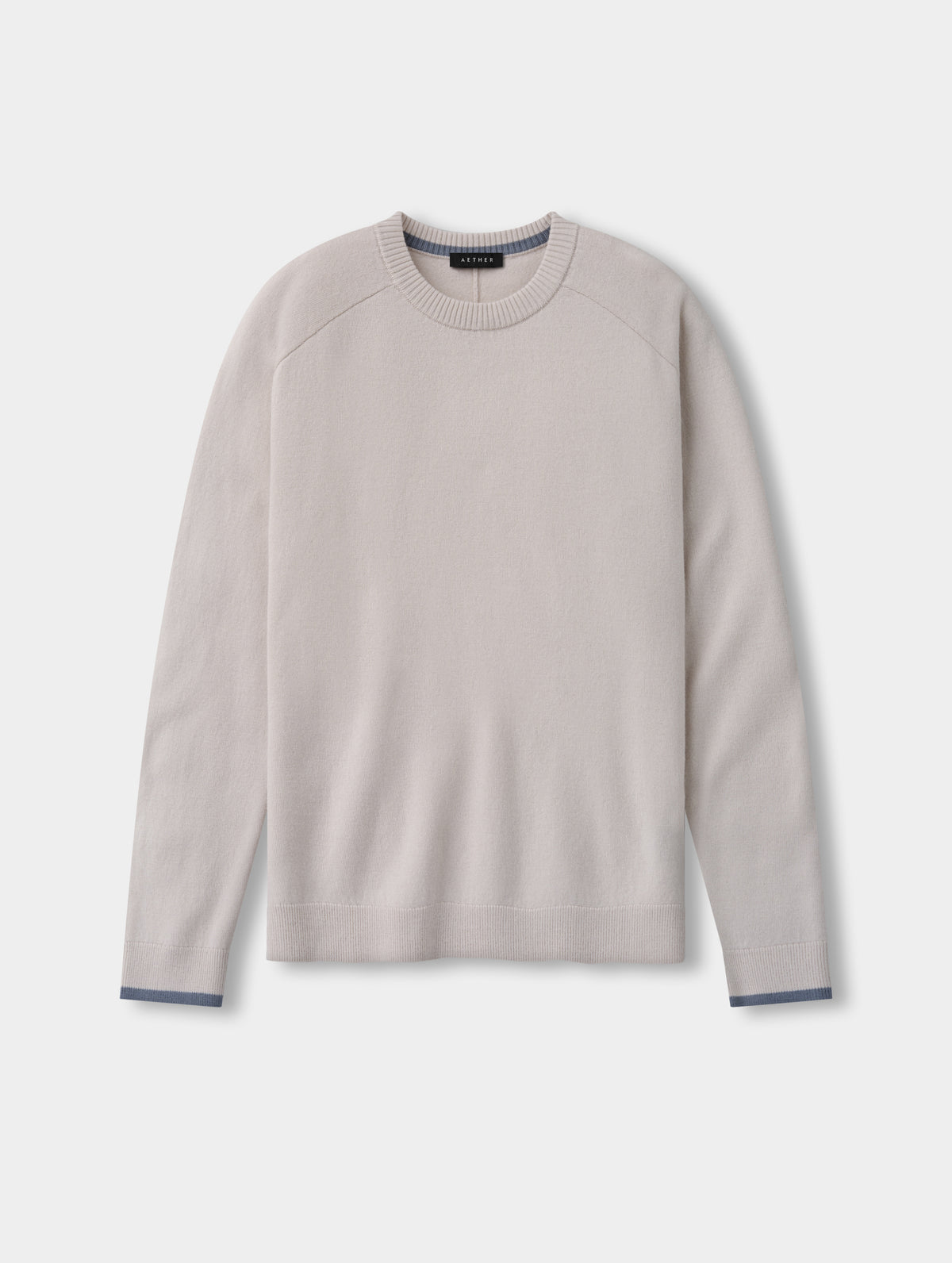 Flat lay view of the Corbin Sweater in Bone from AETHER Apparel.