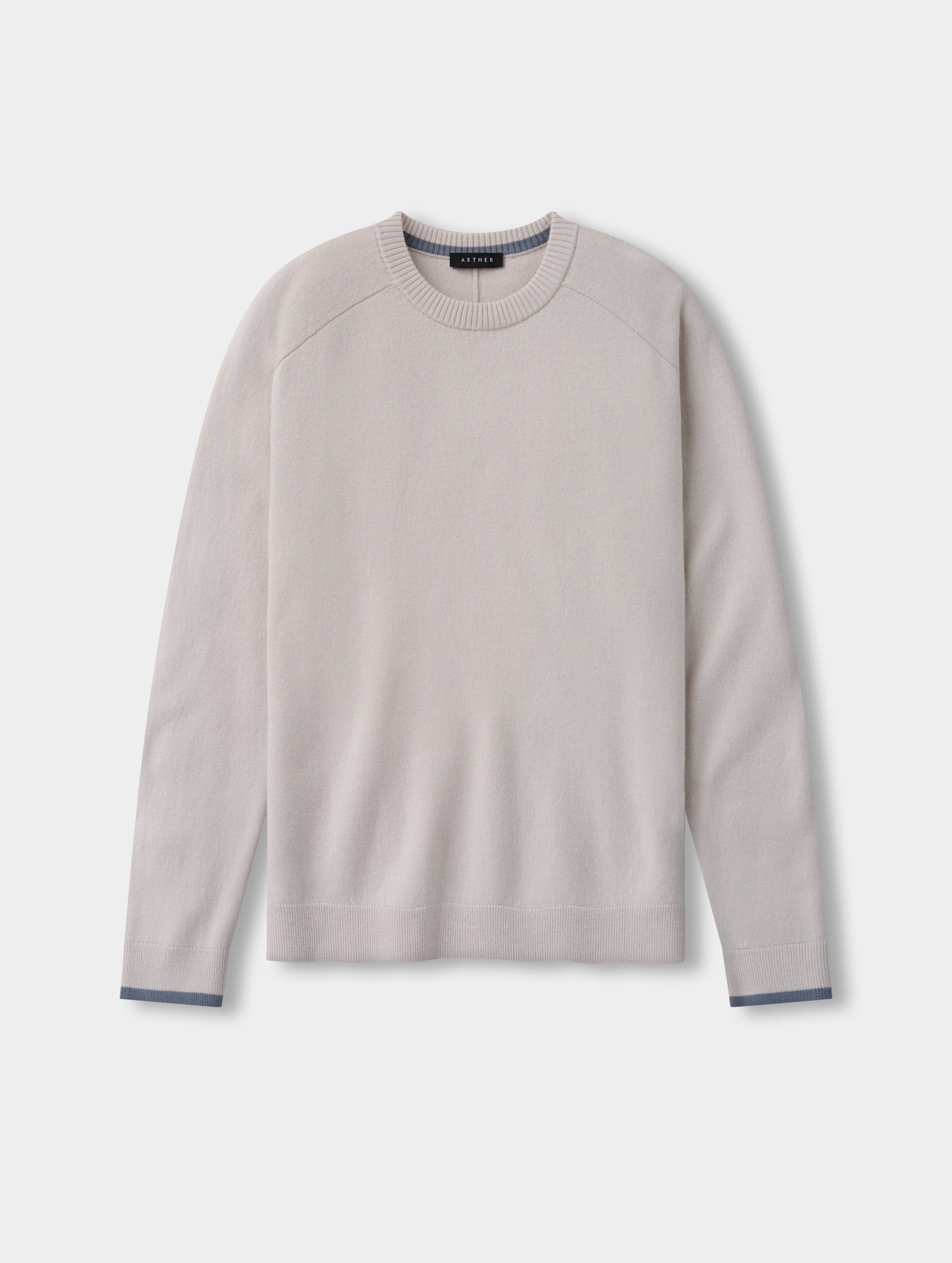 Flat lay view of the Corbin Sweater in Bone from AETHER Apparel.