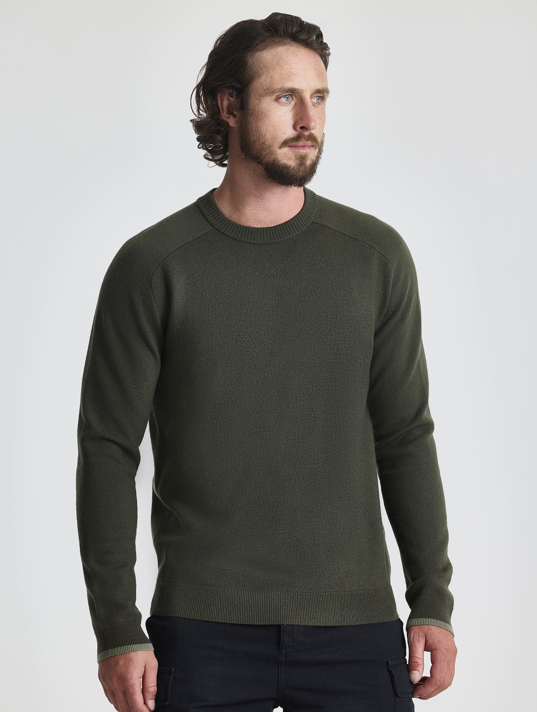 Front view of man wearing Corbin Sweater in Forest Green from AETHER Apparel.