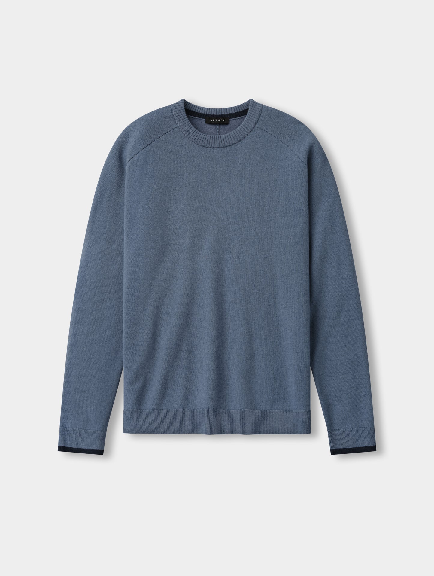 Flat lay view of the Corbin Sweater in Portal Blue from AETHER Apparel.