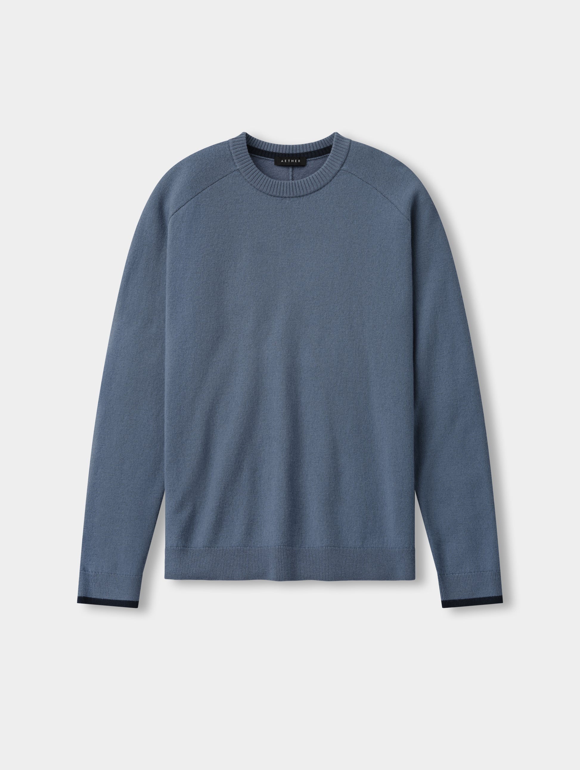 Flat lay view of the Corbin Sweater in Portal Blue from AETHER Apparel.