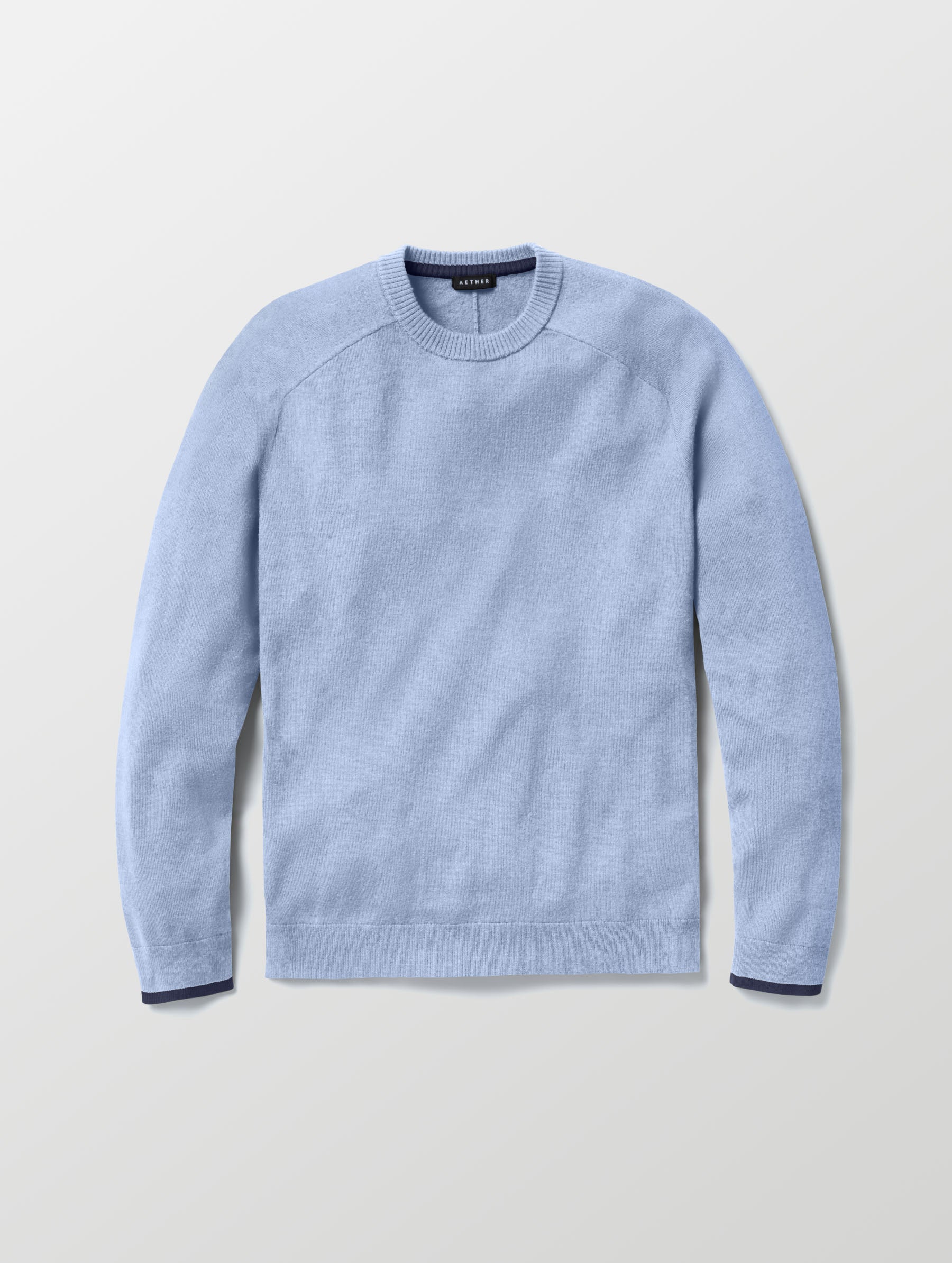 Flat lay of Corbin Sweater in Light Blue Heather from AETHER Apparel. 