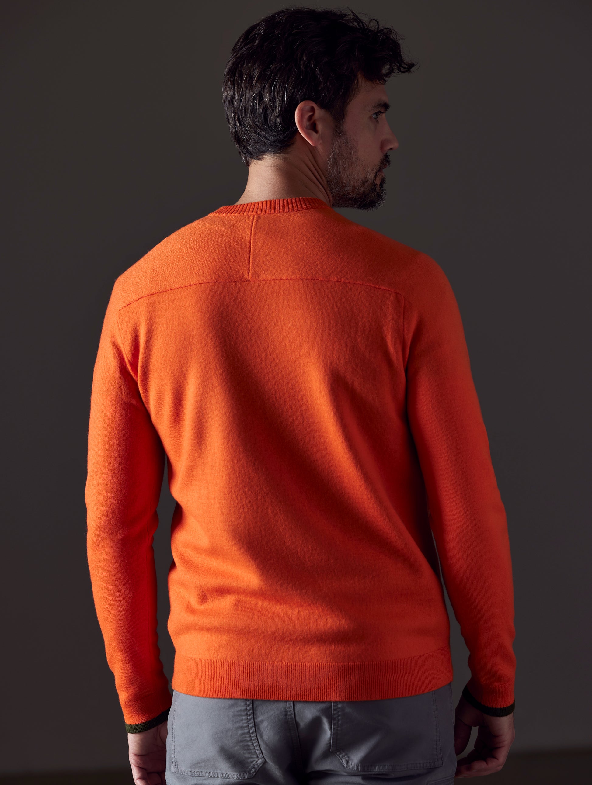man wearing orange sweater from AETHER Apparel