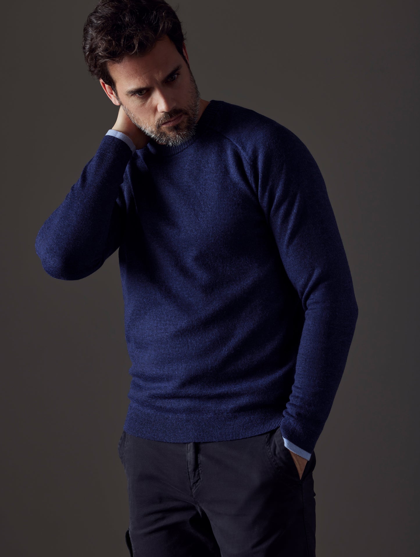 man wearing dark blue sweater from AETHER Apparel