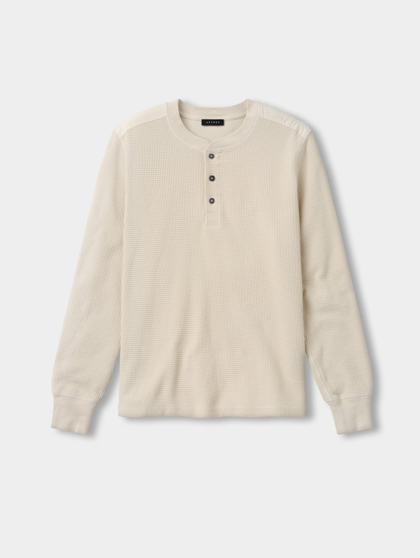 Flat lay view of the Daley Waffle Henley in Bone from AETHER Apparel.