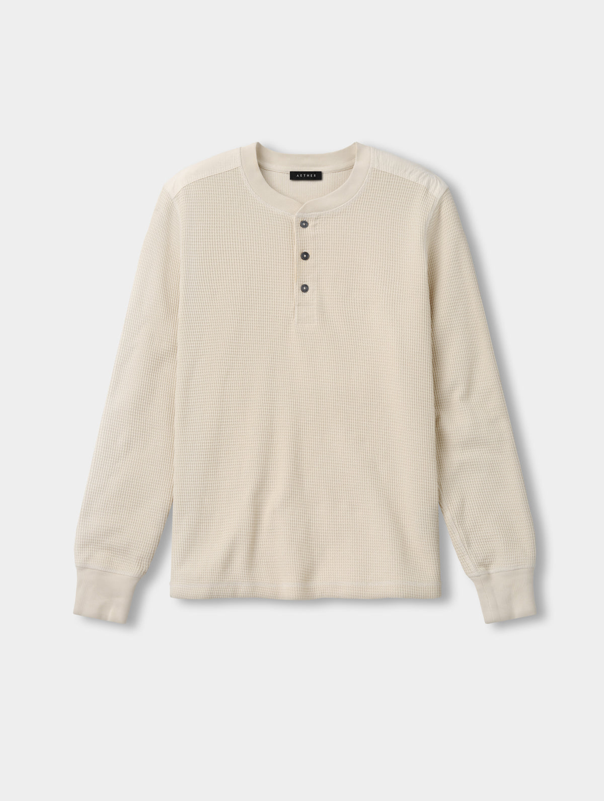 Flat lay view of the Daley Waffle Henley in Bone from AETHER Apparel.