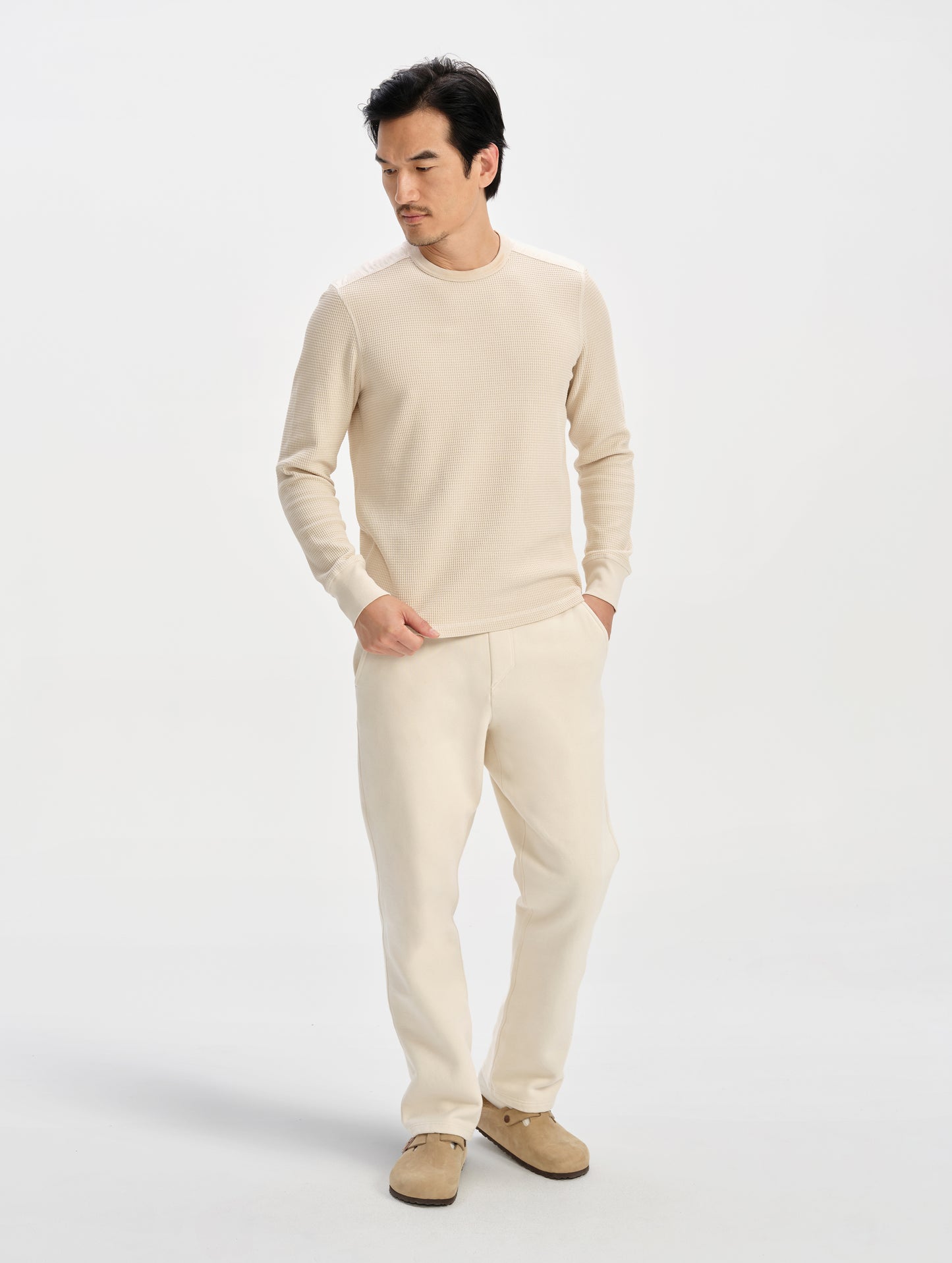 Front full-body view of man wearing the Daley Waffle Shirt in Bone from AETHER Apparel.