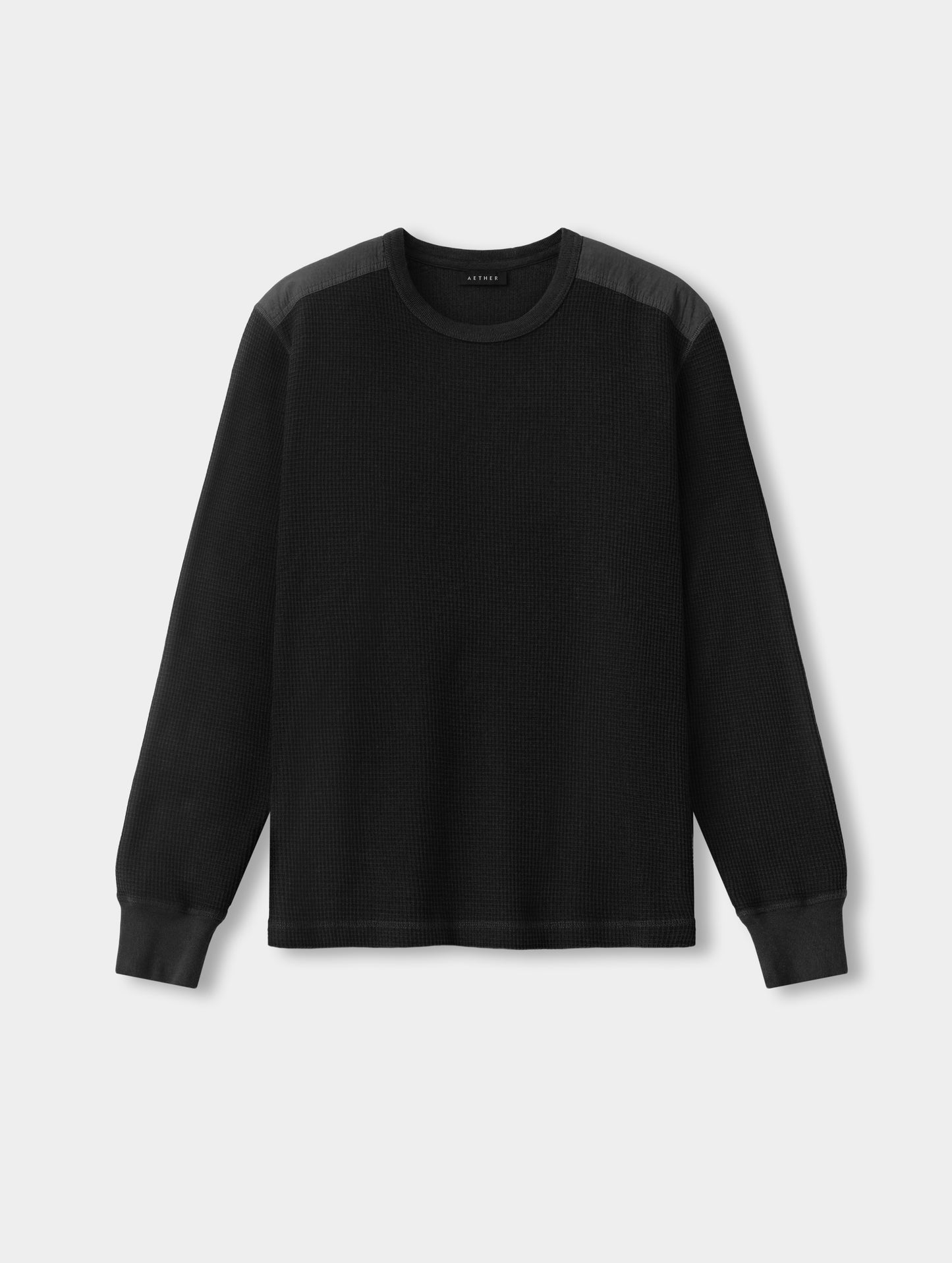 Flat lay view of the Daley Waffle Shirt in Onyx Black from AETHER Apparel.
