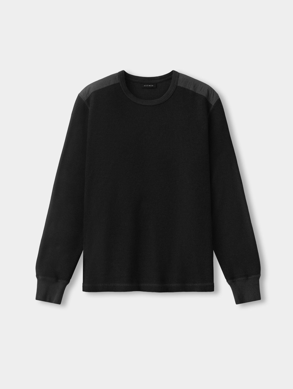 Flat lay view of the Daley Waffle Shirt in Onyx Black from AETHER Apparel.