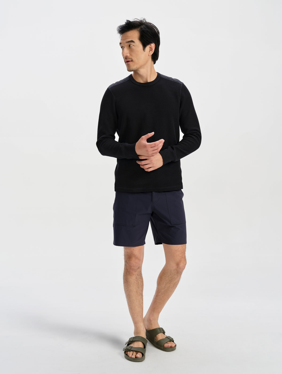 Front full-body view of man wearing the Daley Waffle Shirt in Onyx Black from AETHER Apparel.
