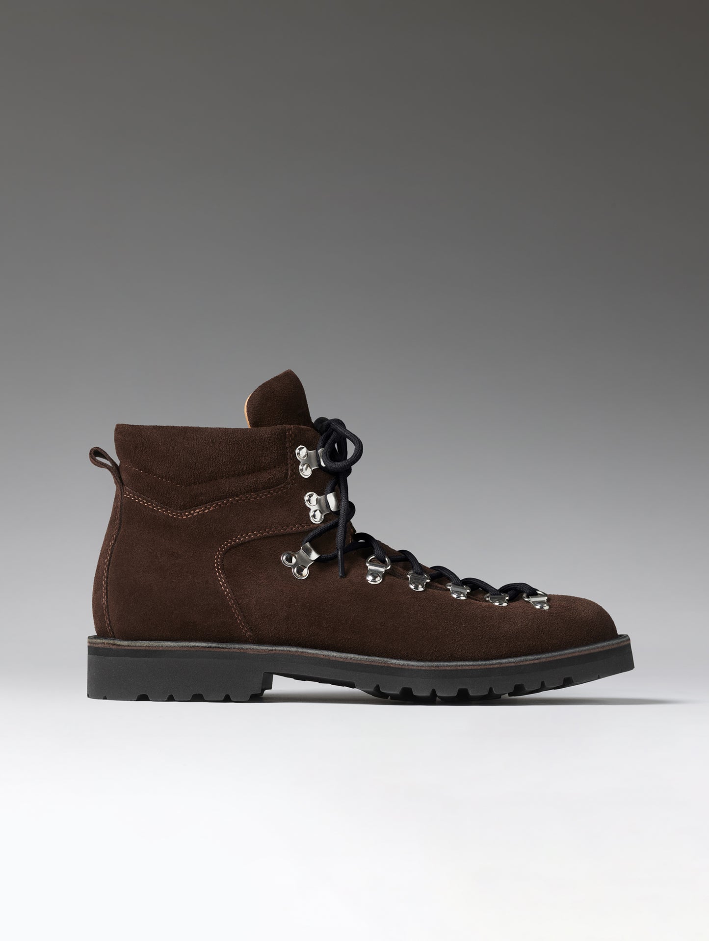 Side profile view of the men's Dolomite Boot in Espresso Brown from AETHER Apparel.