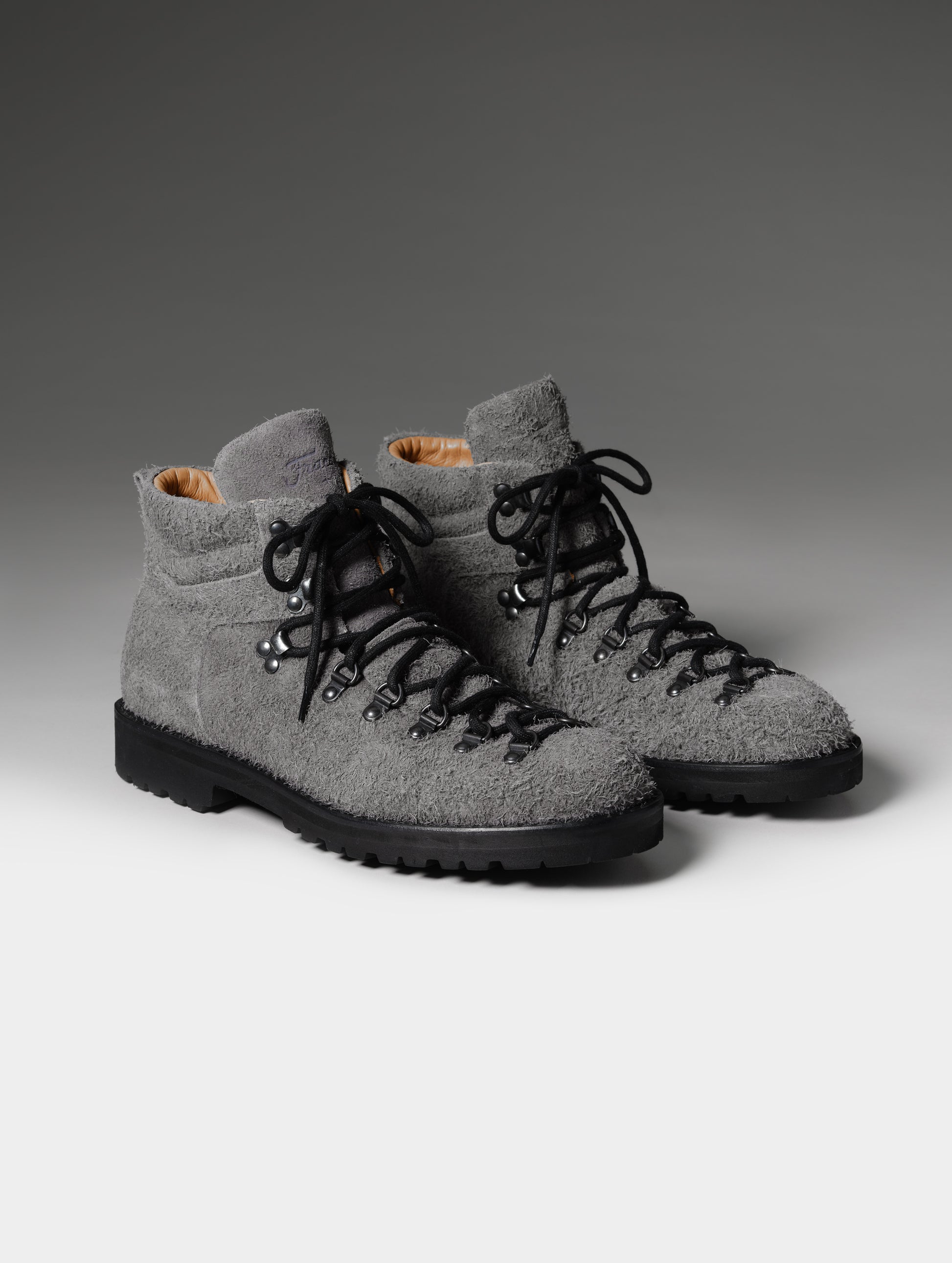 Front 3/4 studio shot of the Dolomite Boot in Cement with black laces from AETHER Apparel.