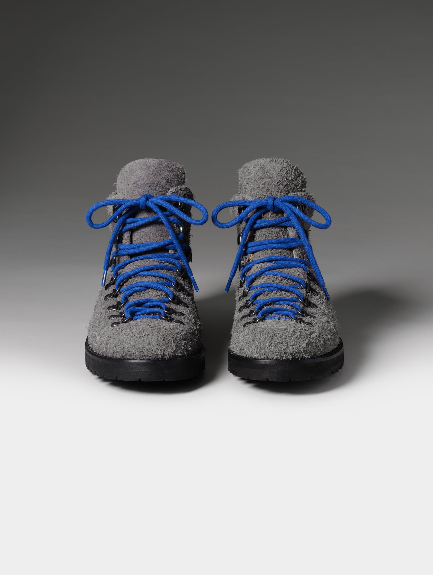 Front studio shot of the Dolomite Boot in Cement with blue laces from AETHER Apparel.