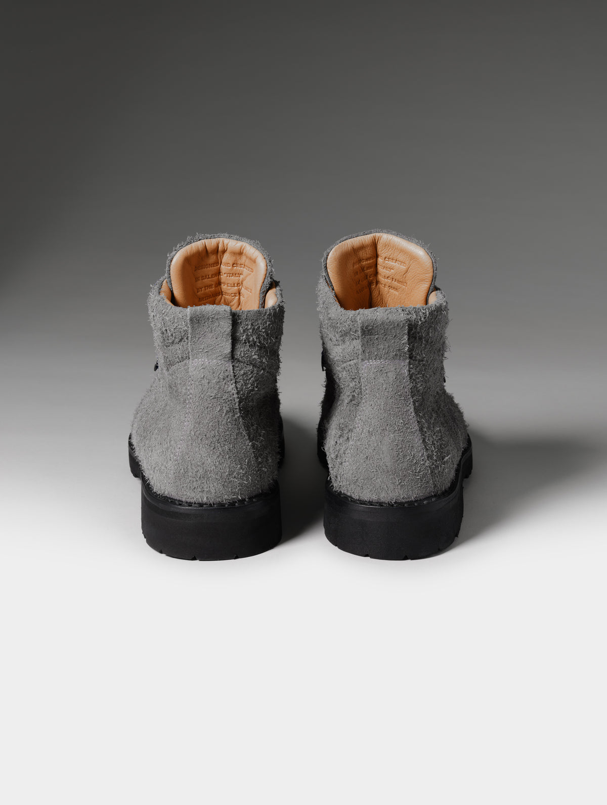 Rear studio shot of the Dolomite Boot in Cement from AETHER Apparel.