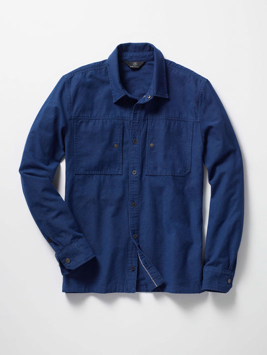 Flay lay of the Emerson Button Down in Dark Blue from AETHER Apparel.