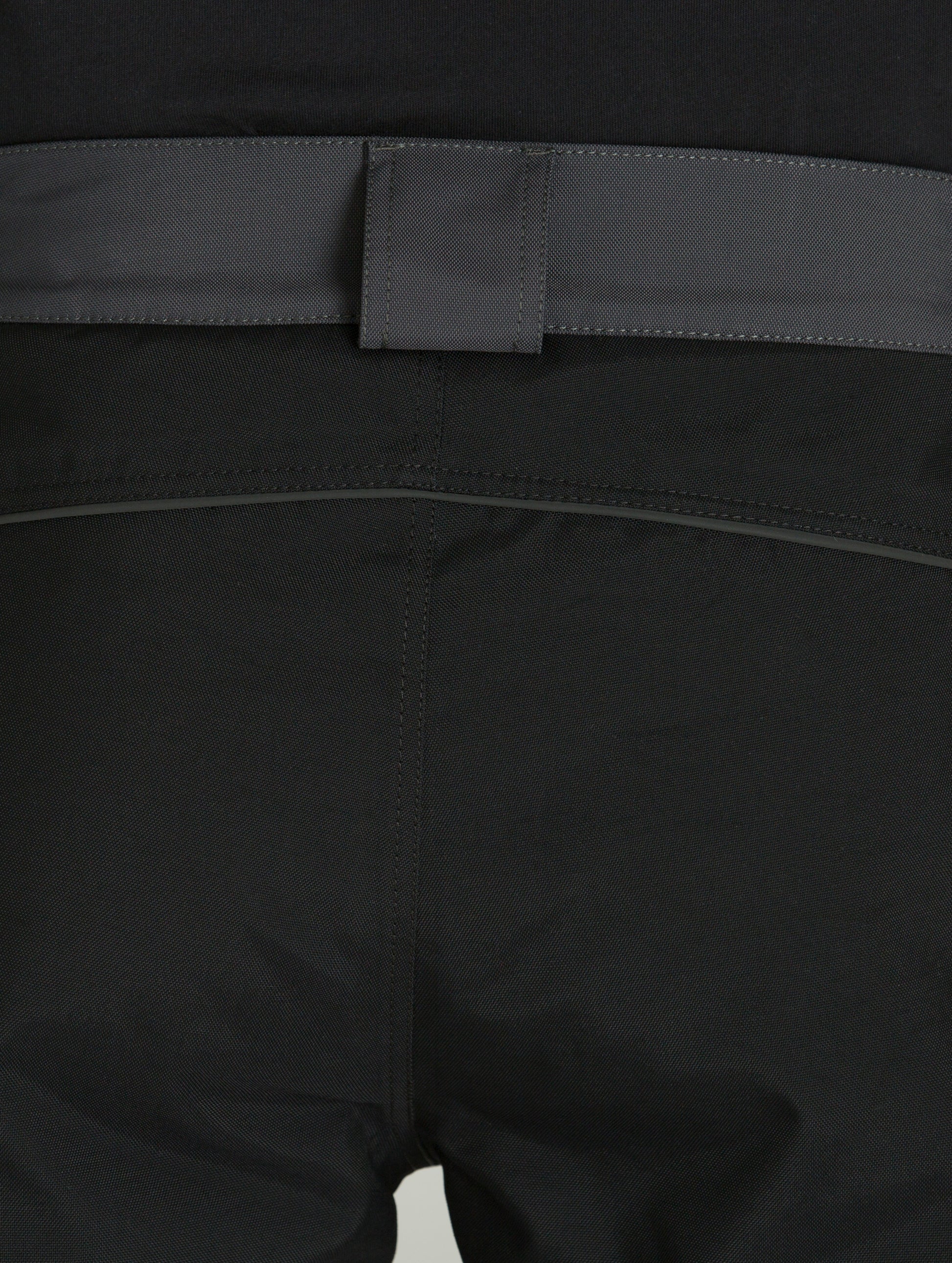 Back view of dark grey Expedition Motorcycle Pant, closely displaying seat and belt.