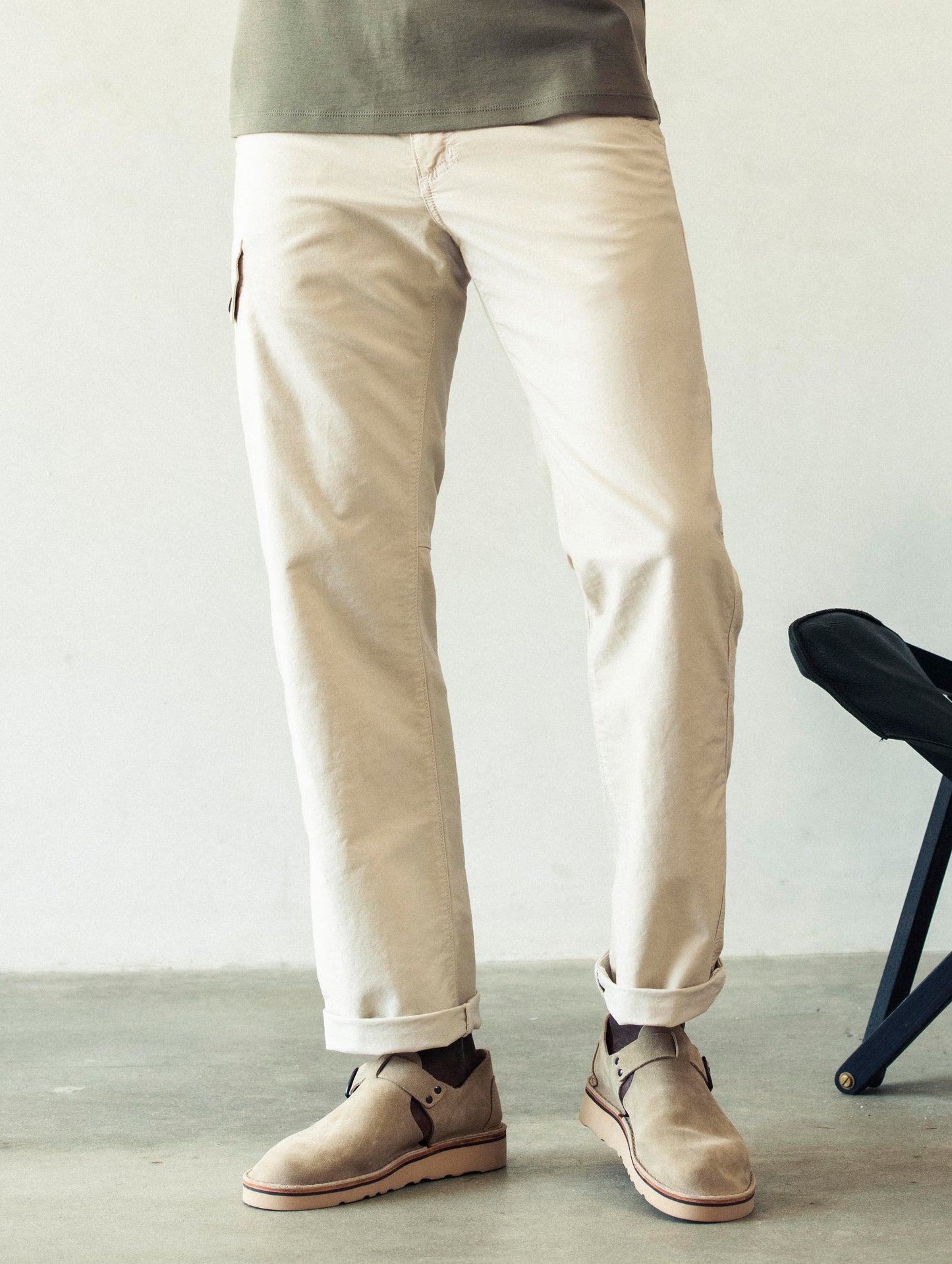 Front lower body view of man wearing Fairfax Pant 2.0 in Bone white from AETHER Apparel.