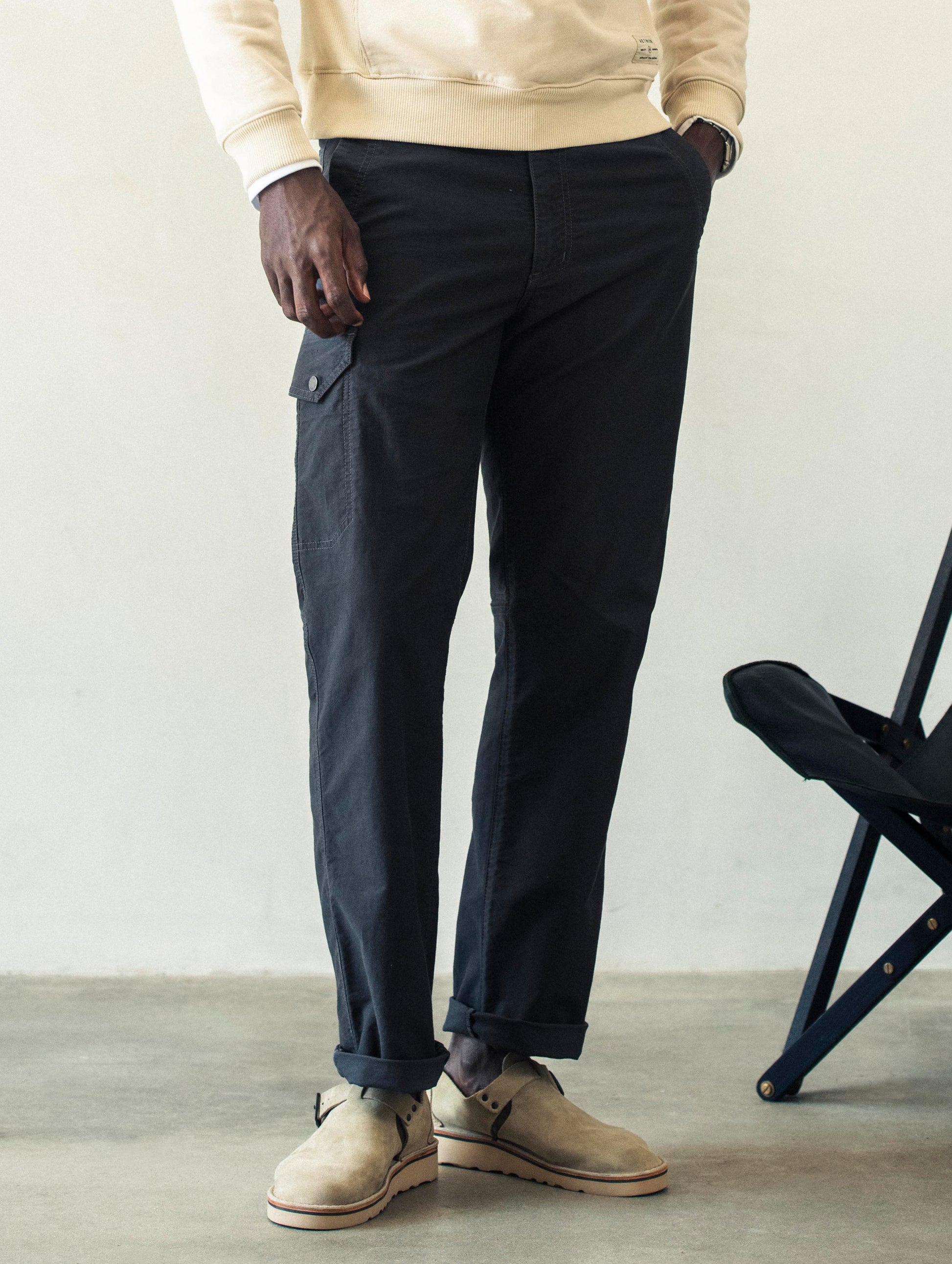 Front lower body view of man wearing Fairfax Pant 2.0 in Graphite from AETHER Apparel.