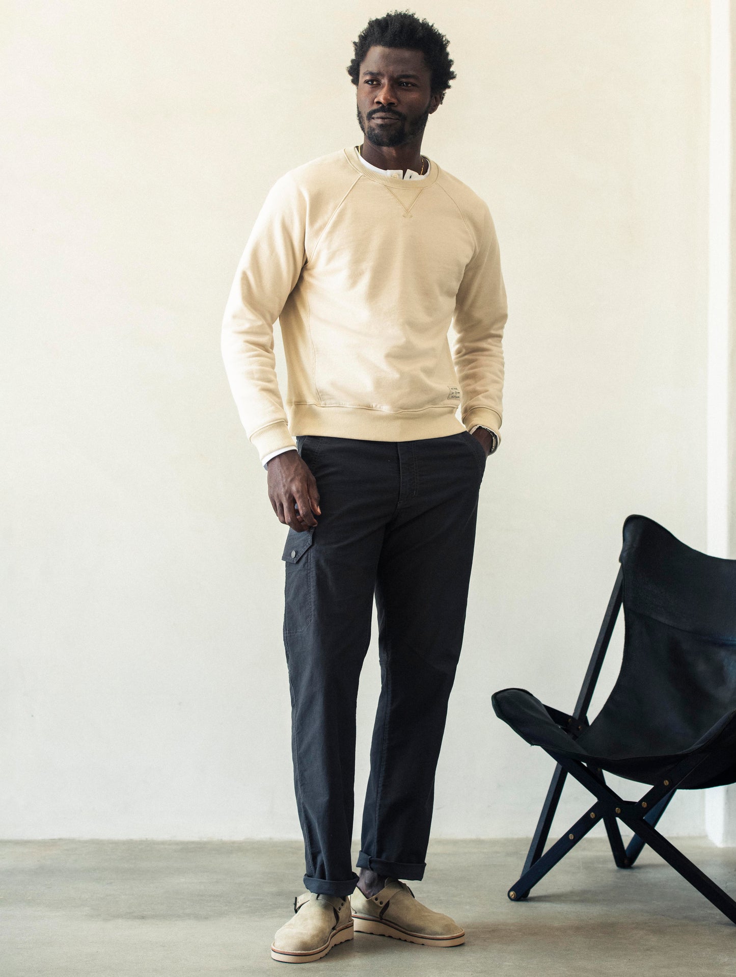 Front full-body view of man wearing Fairfax Pant 2.0 in Graphite from AETHER Apparel.