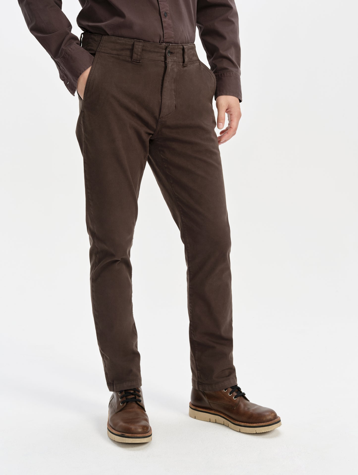 Front lower-body view of man wearing the Flint Chino Pant in Ash Brown from AETHER Apparel.