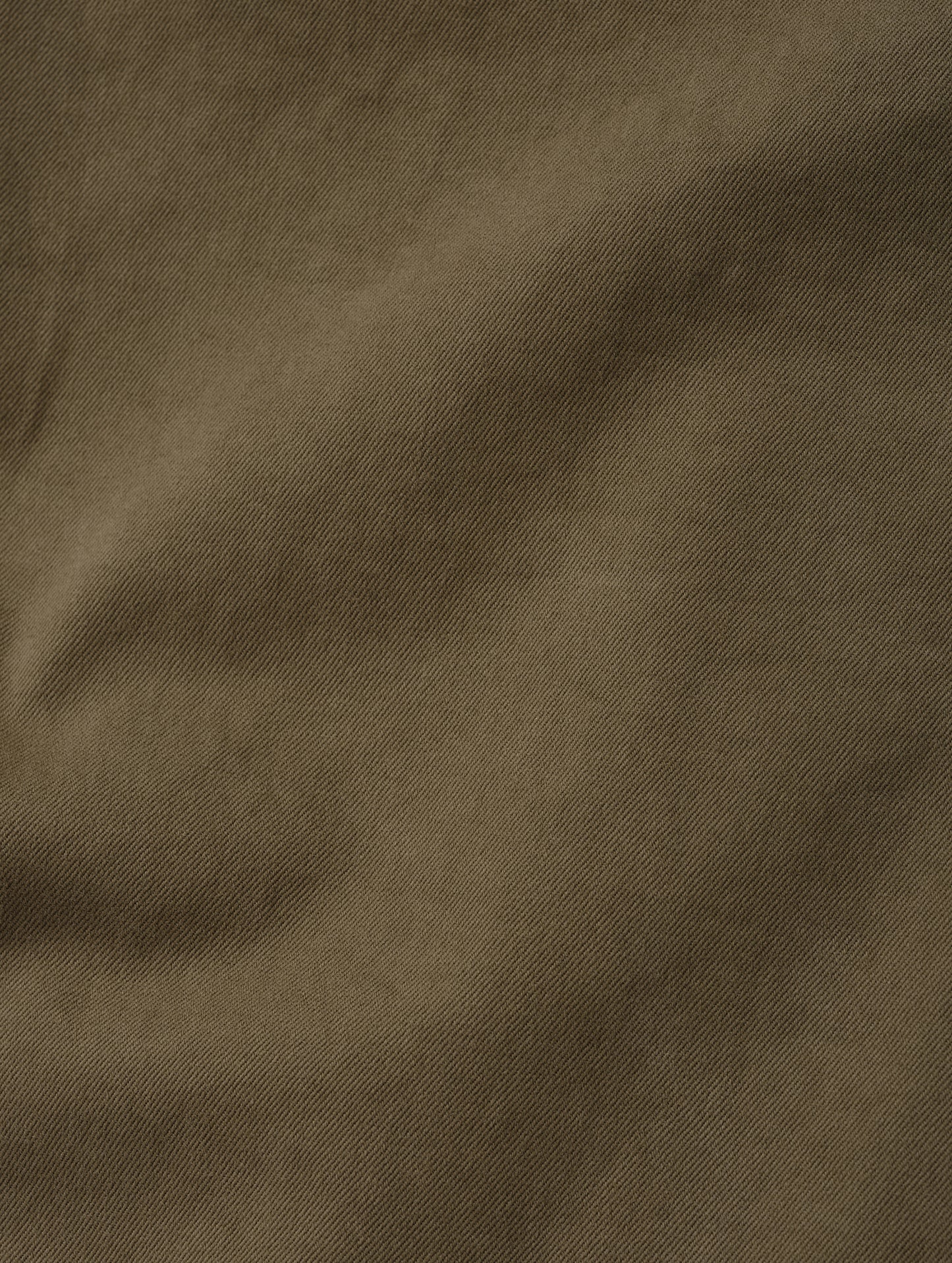 Closeup detailed view of the brushed fine twill construction on the Flint Chino Pant in Cadet from AETHER Apparel.
