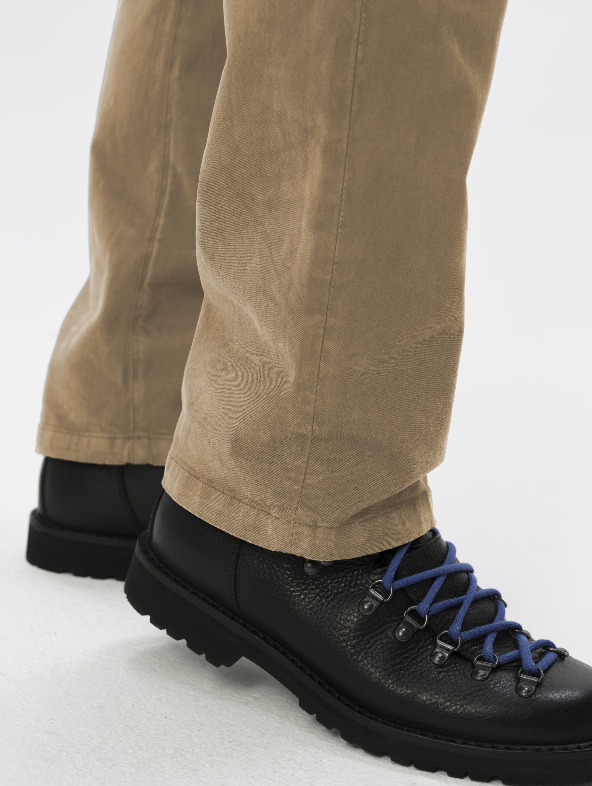 Closeup detailed view of the leg cuffs on the Flint Chino Pant in Desert Tan from AETHER Apparel.