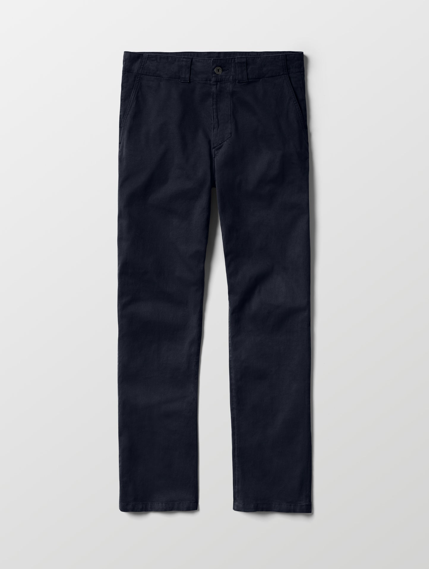 Flat lay of the Flint Chino Pant in Total Eclipse dark blue from AETHER Apparel.
