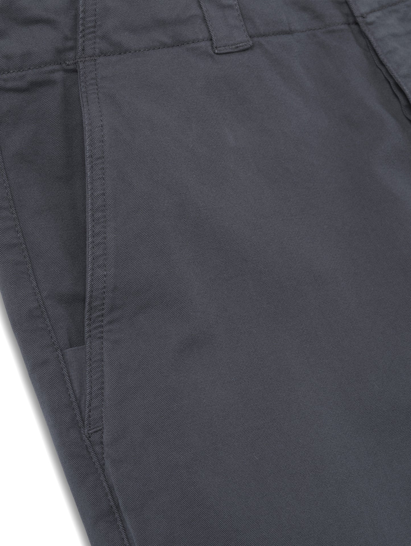 Closeup detailed view of the right hand pocket on the Gabriel Articulated Chino in Graphite from AETHER Apparel.