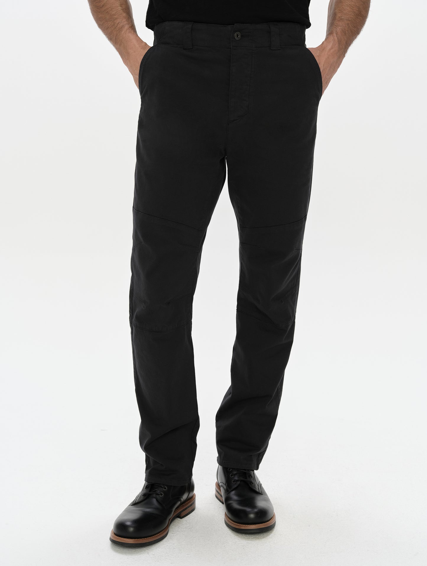 Front, lower-body view of man wearing the Gabriel Articulated Chino in Onyx Black from AETHER Apparel.