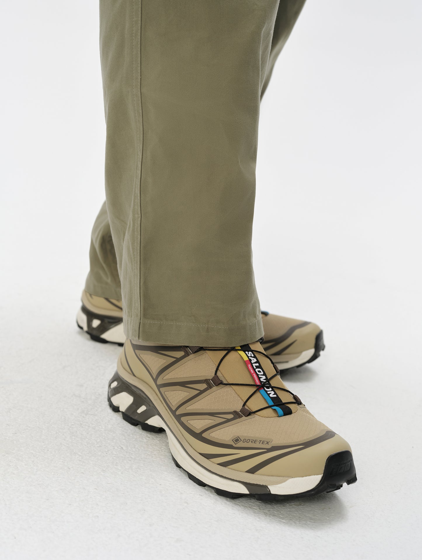 Closeup detailed view of the leg cuffs on the Gage Cotton Pant in Fern Green from AETHER Apparel.