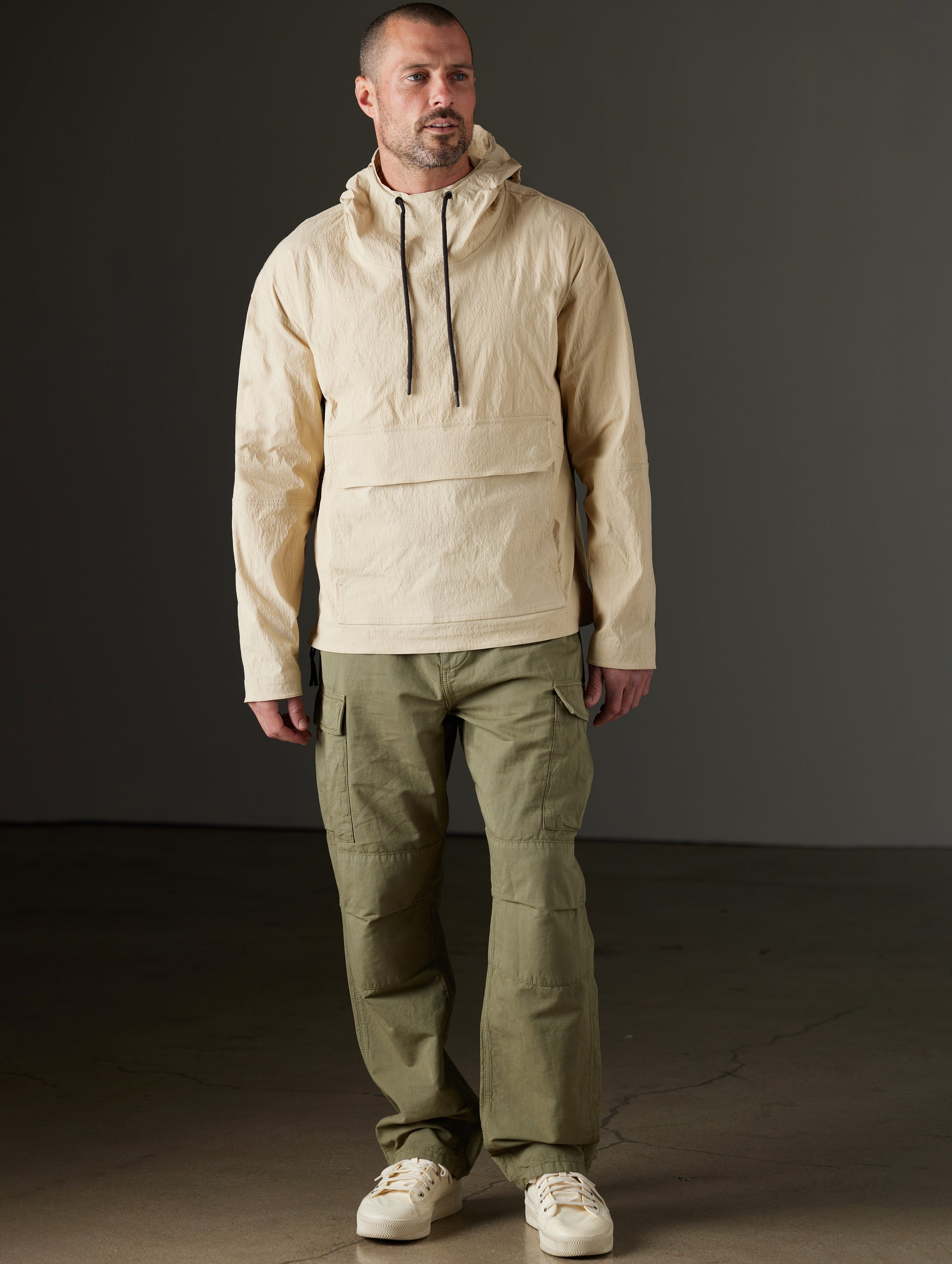 Man wearing beige anorak from AETHER Apparel