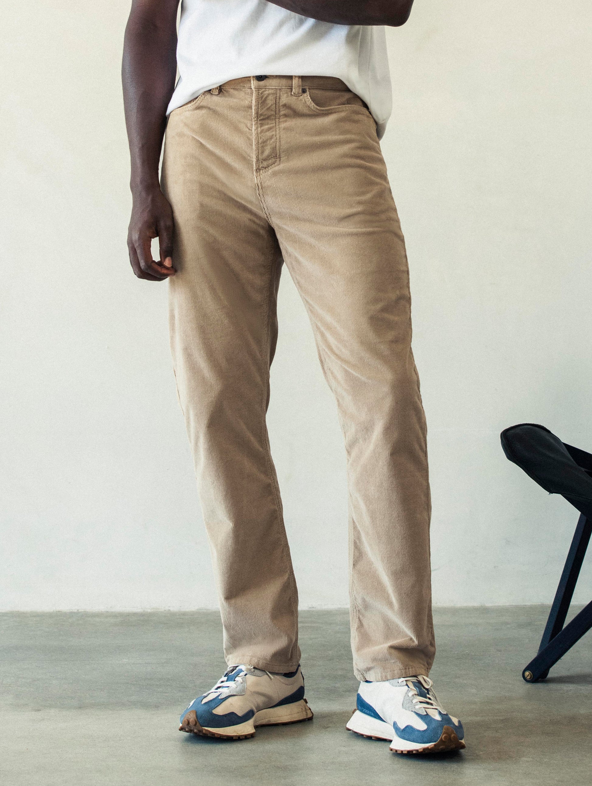 Front lower body view of man wearing Hayden Corduroy Pant in Desert Tan from AETHER Apparel.