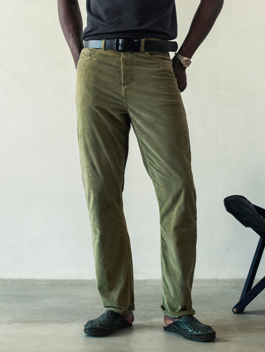 Front lower body view of man wearing Hayden Corduroy Pant in Fern Green from AETHER Apparel.