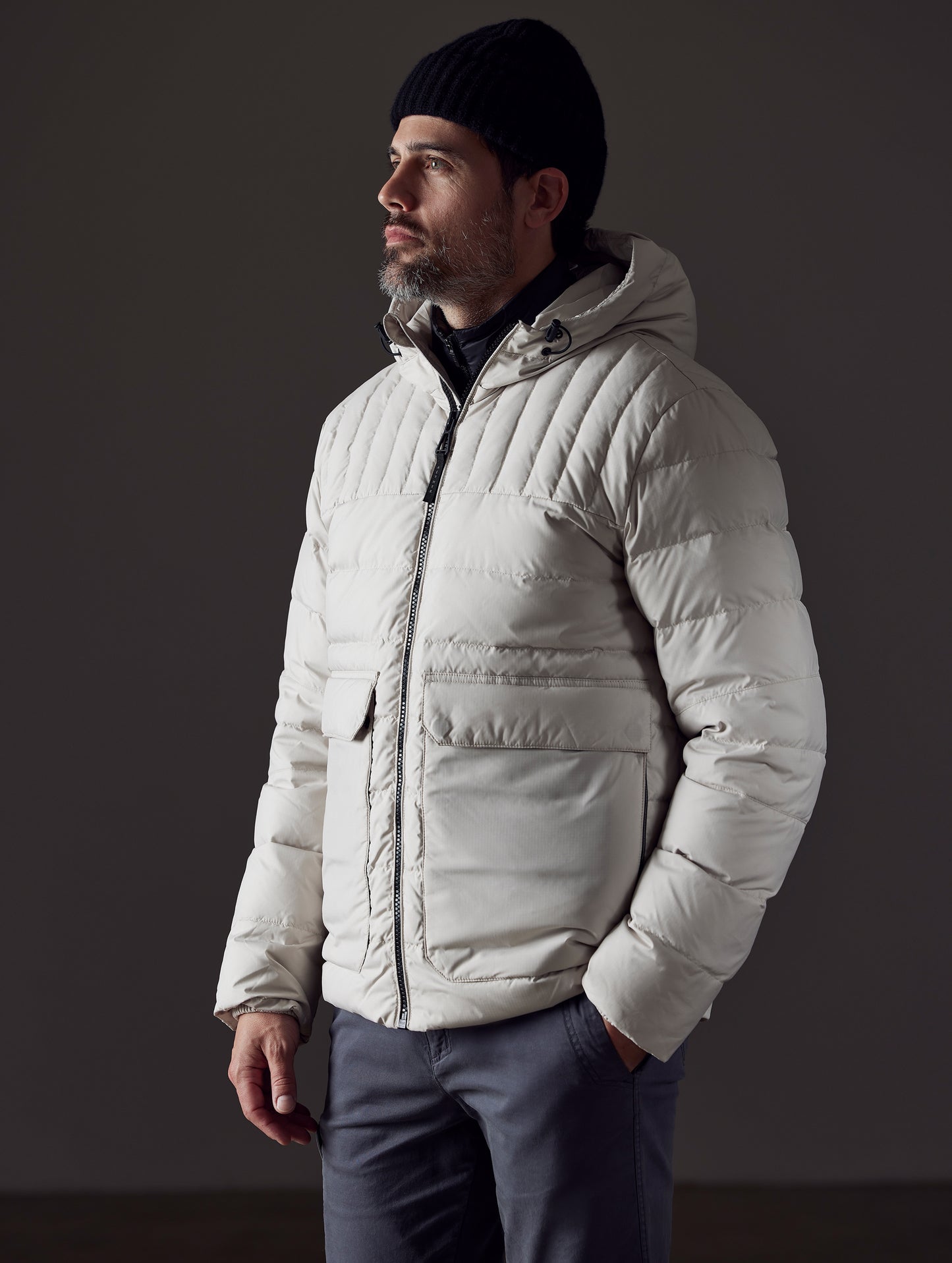 man wearing beige insulated jacket from AETHER Apparel