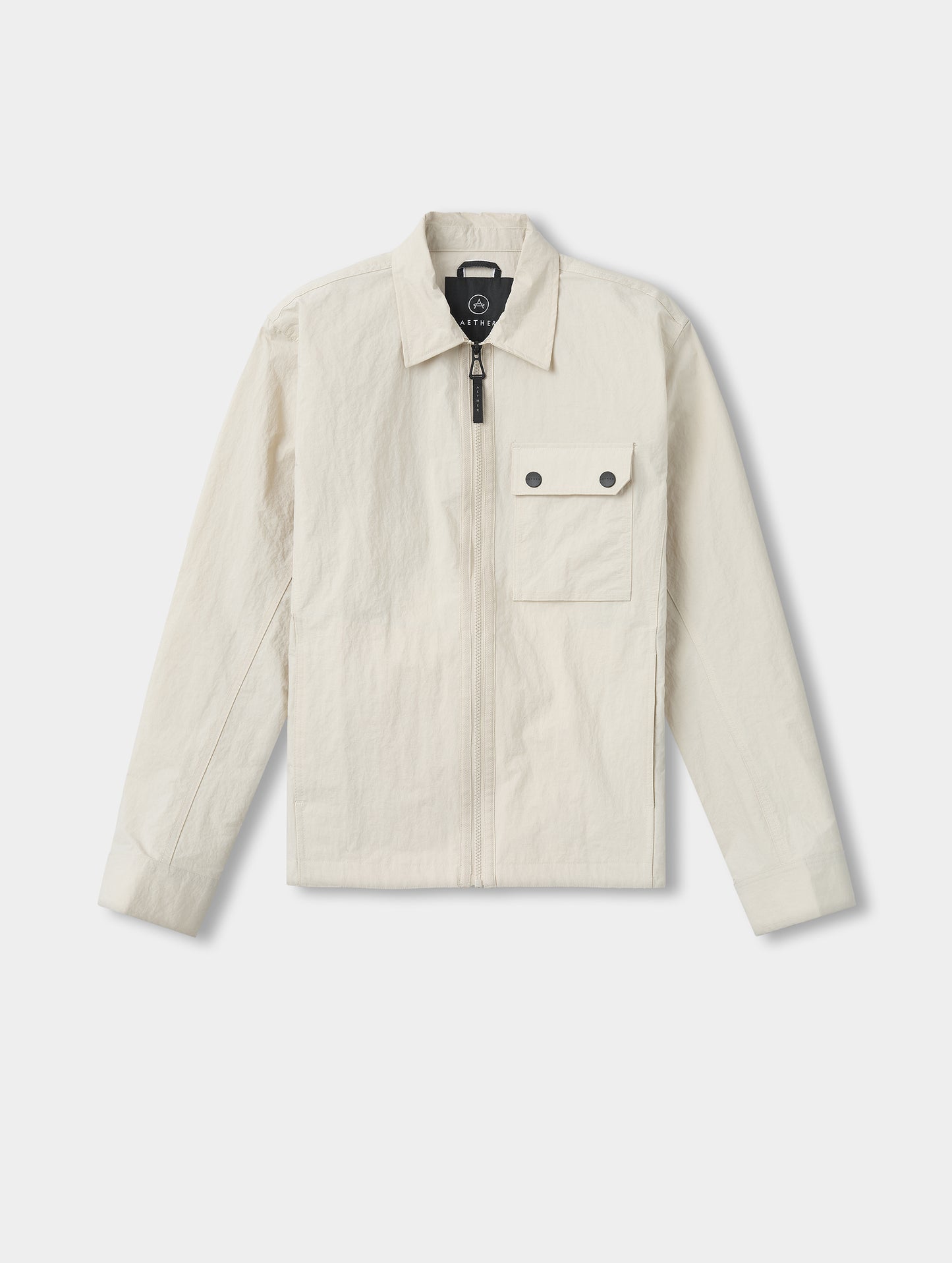 Flat lay view of the Landon Jacket in Bone from AETHER Apparel.