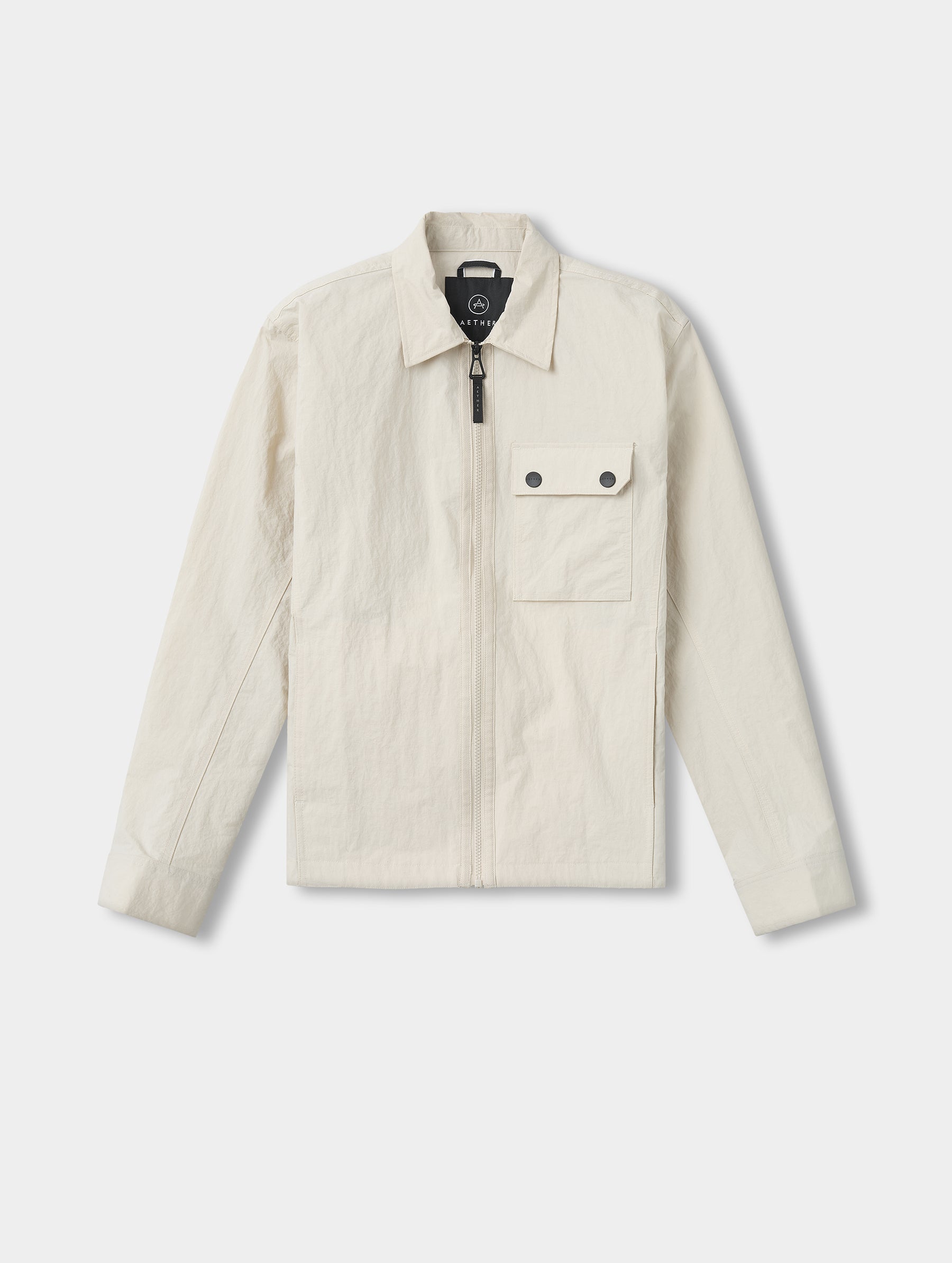 Flat lay view of the Landon Jacket in Bone from AETHER Apparel.