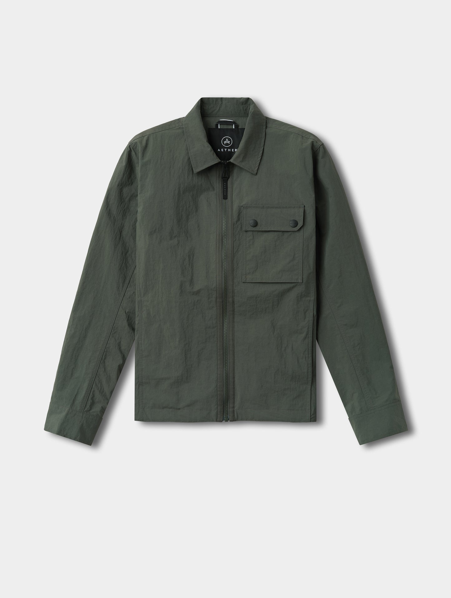 Flat lay view of the Landon Jacket in Saville Green from AETHER Apparel.