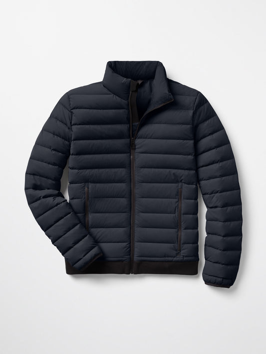 Flat lay of Launch Jacket in Onyx Black from AETHER Apparel.