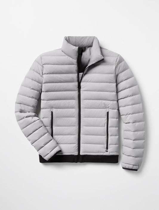 Flat lay of Launch Jacket in Sky Grey from AETHER Apparel.