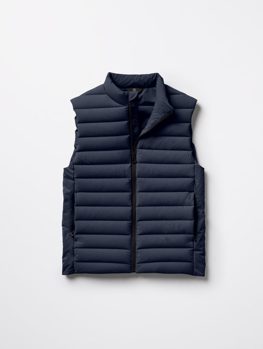 Flat lay of Launch Vest in Total Eclipse dark blue from AETHER Apparel.