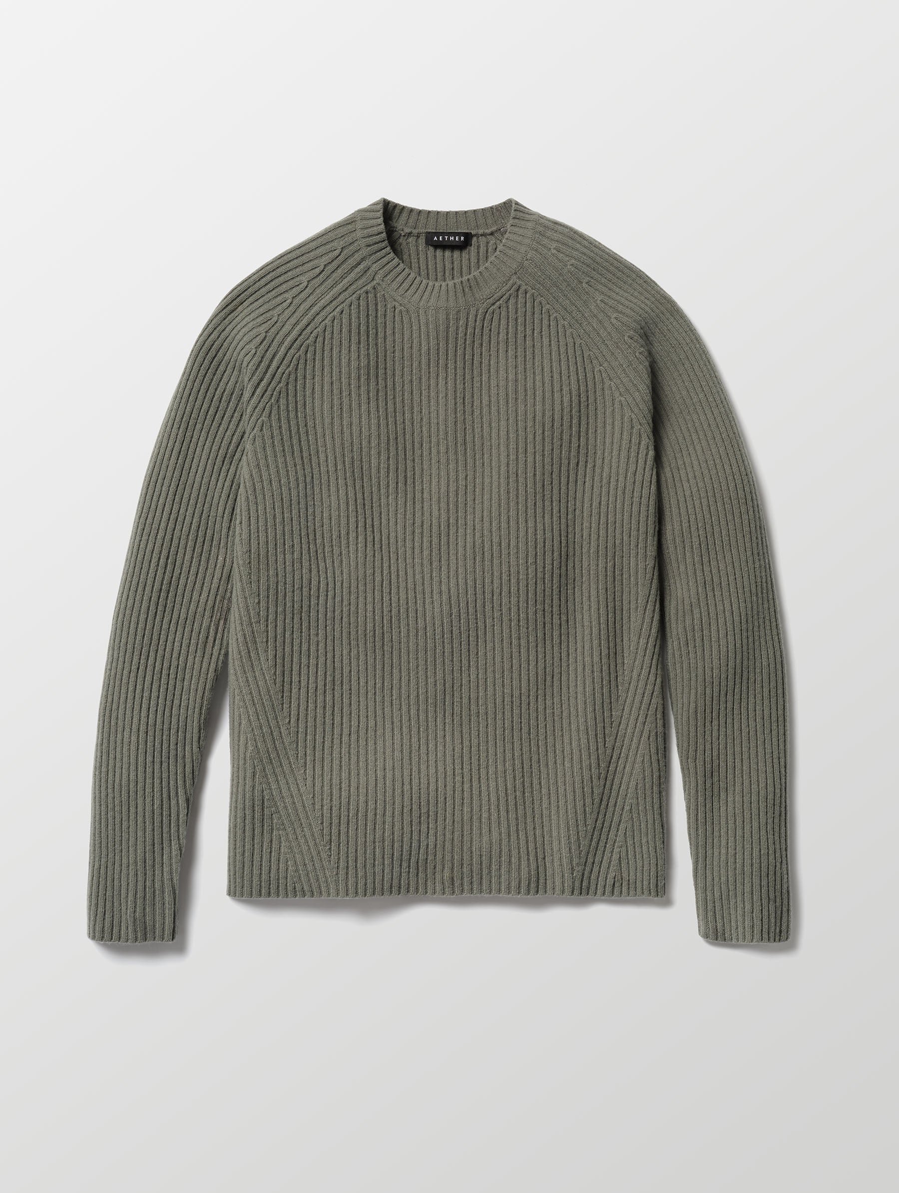 Flat lay of Lyon Sweater in Gunmetal grey from AETHER Apparel. 