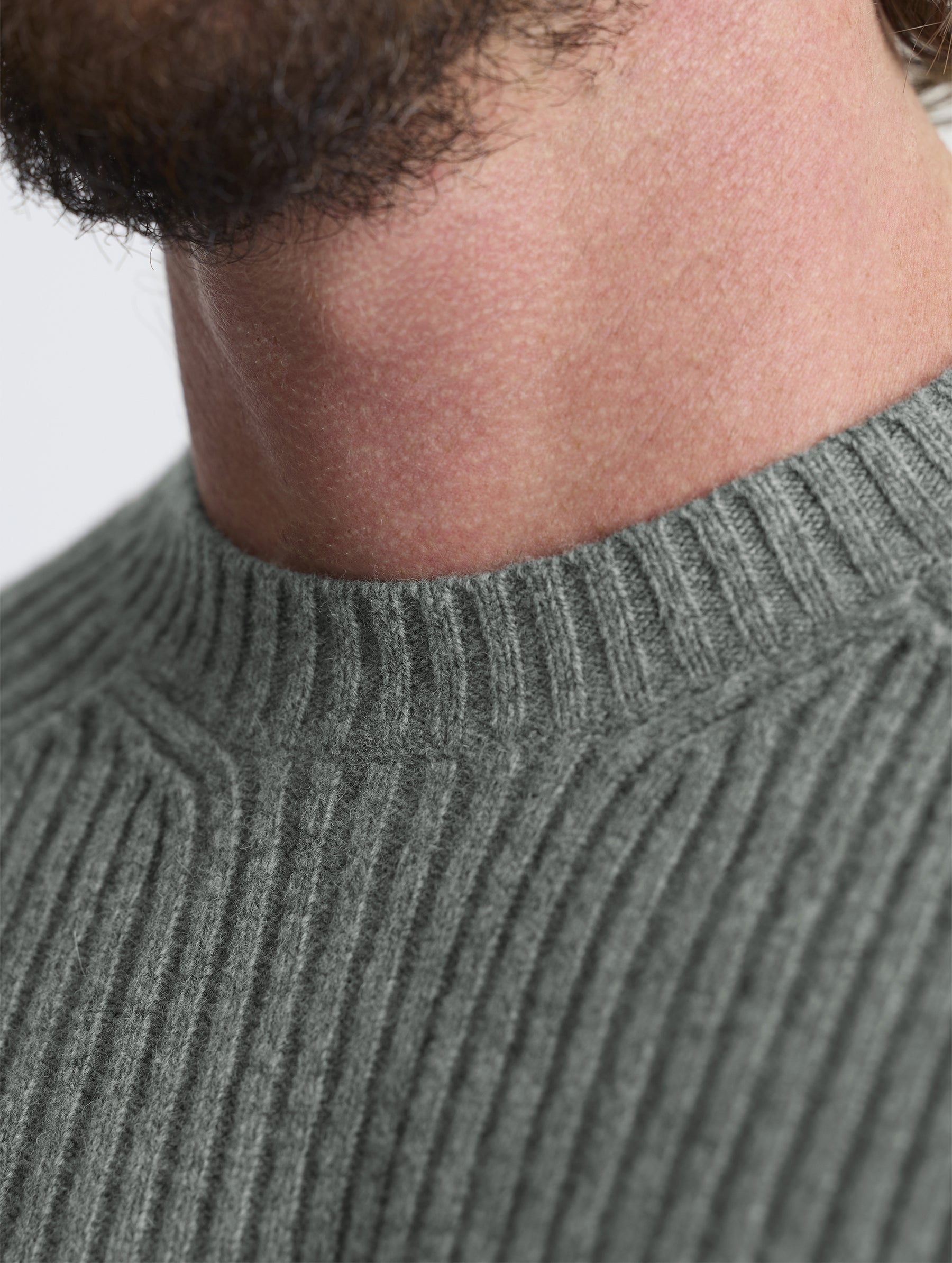 Closeup detail view of collar of Lyon Sweater in Gunmetal grey from AETHER Apparel.