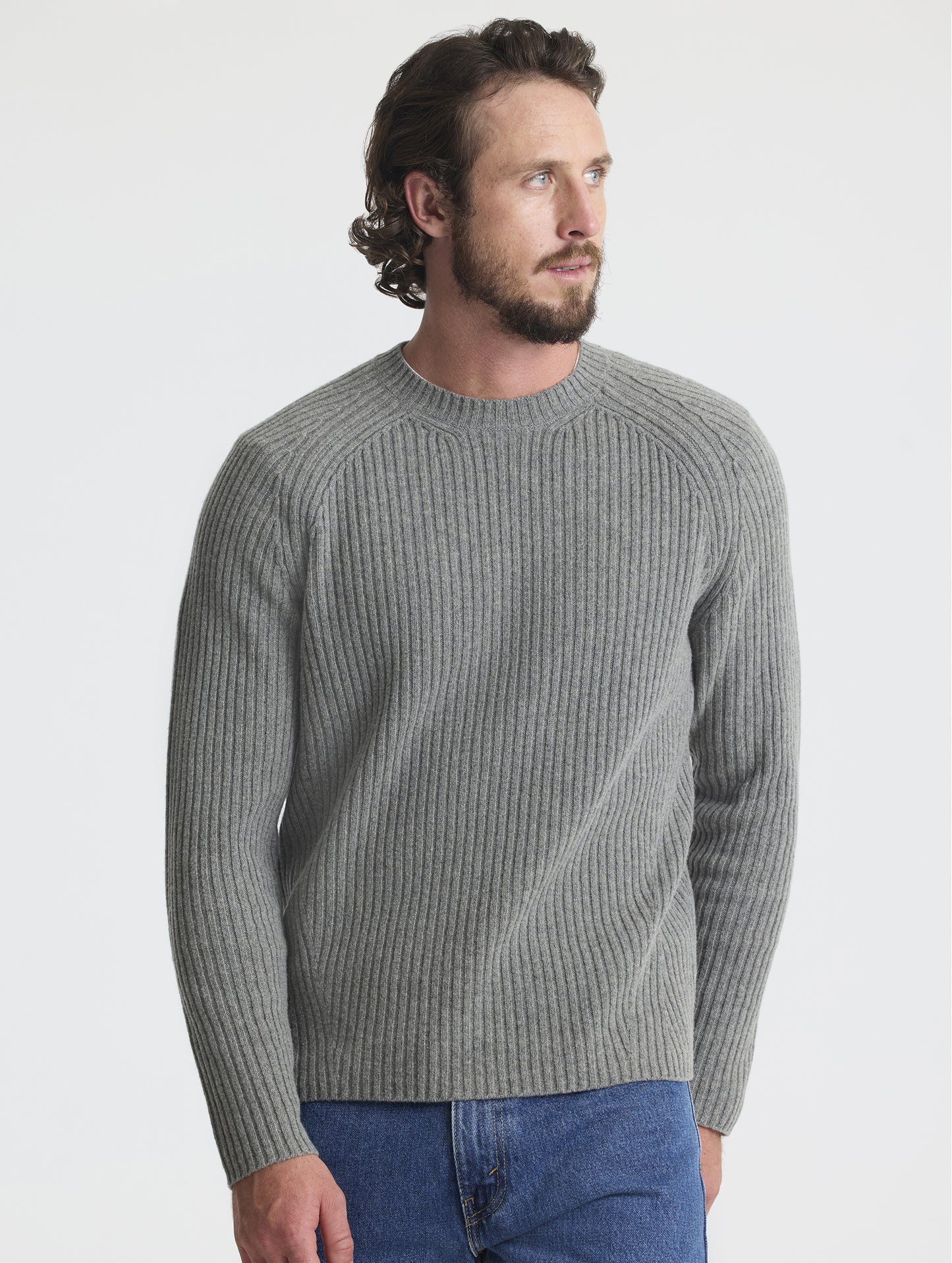 Front view of man wearing Lyon Sweater in Heather Grey from AETHER Apparel.