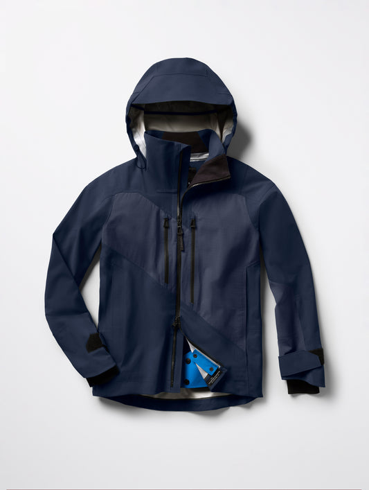 Flat lay of Maverick Snow-Shell Jacket in Total Eclipse dark blue from AETHER Apparel.