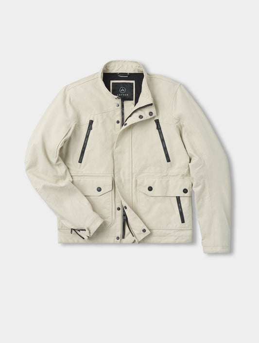 Flat lay view of the Mojave Motorcycle Jacket 2.0 in Bone from AETHER Apparel.