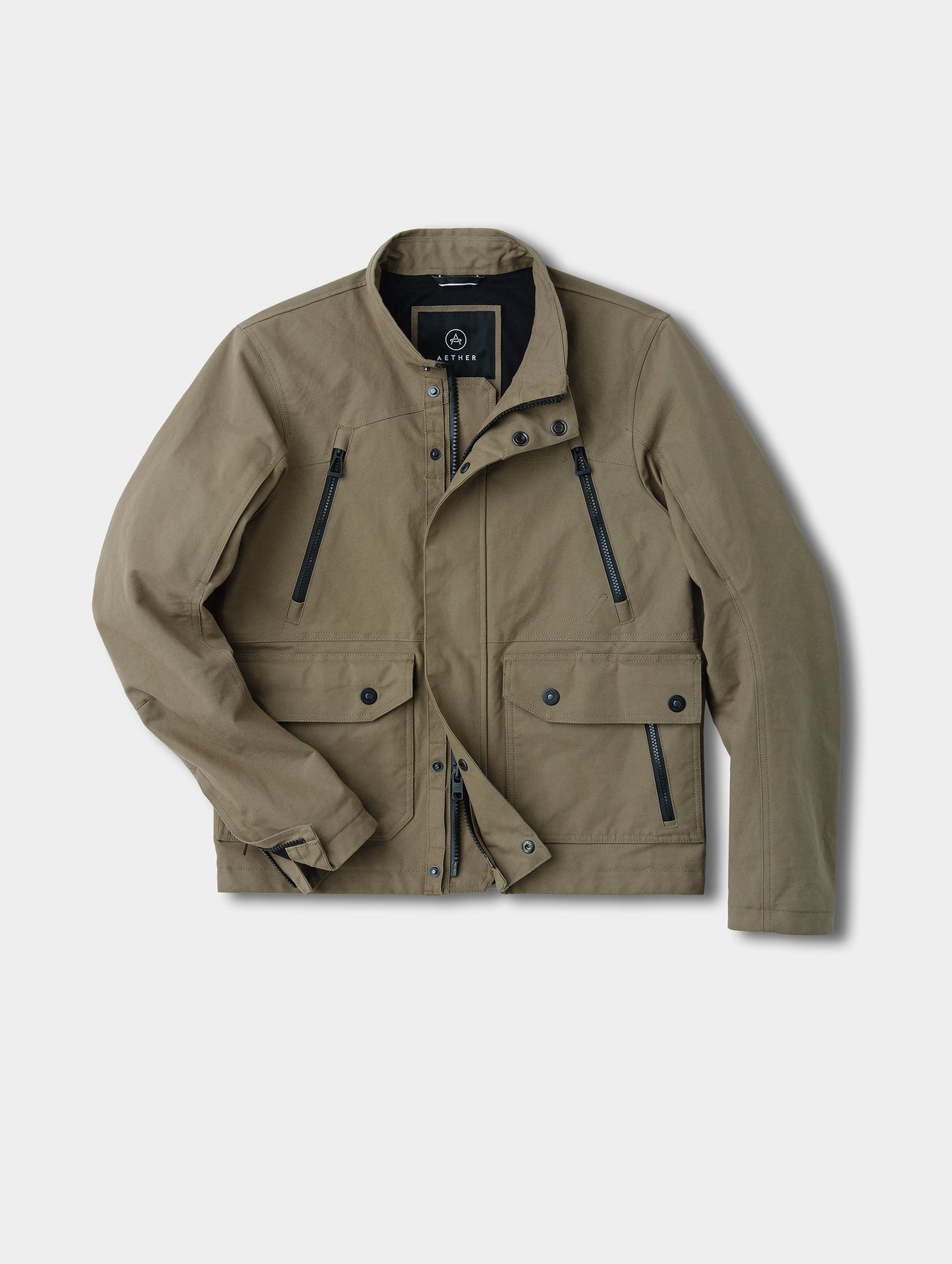 Flat lay view of the Mojave Motorcycle Jacket 2.0 in Stone Brown from AETHER Apparel.