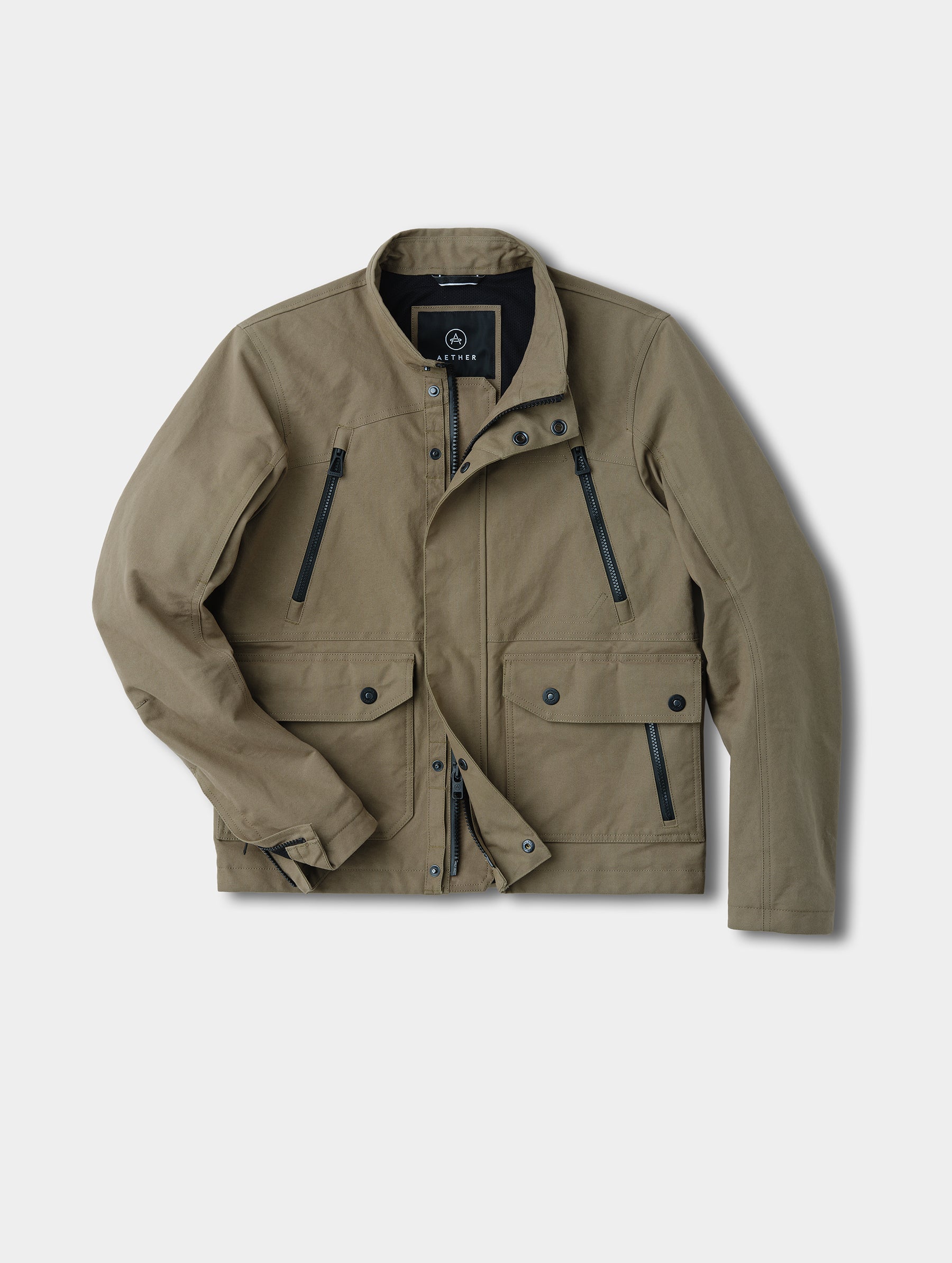 Flat lay view of the Mojave Motorcycle Jacket 2.0 in Stone Brown from AETHER Apparel.