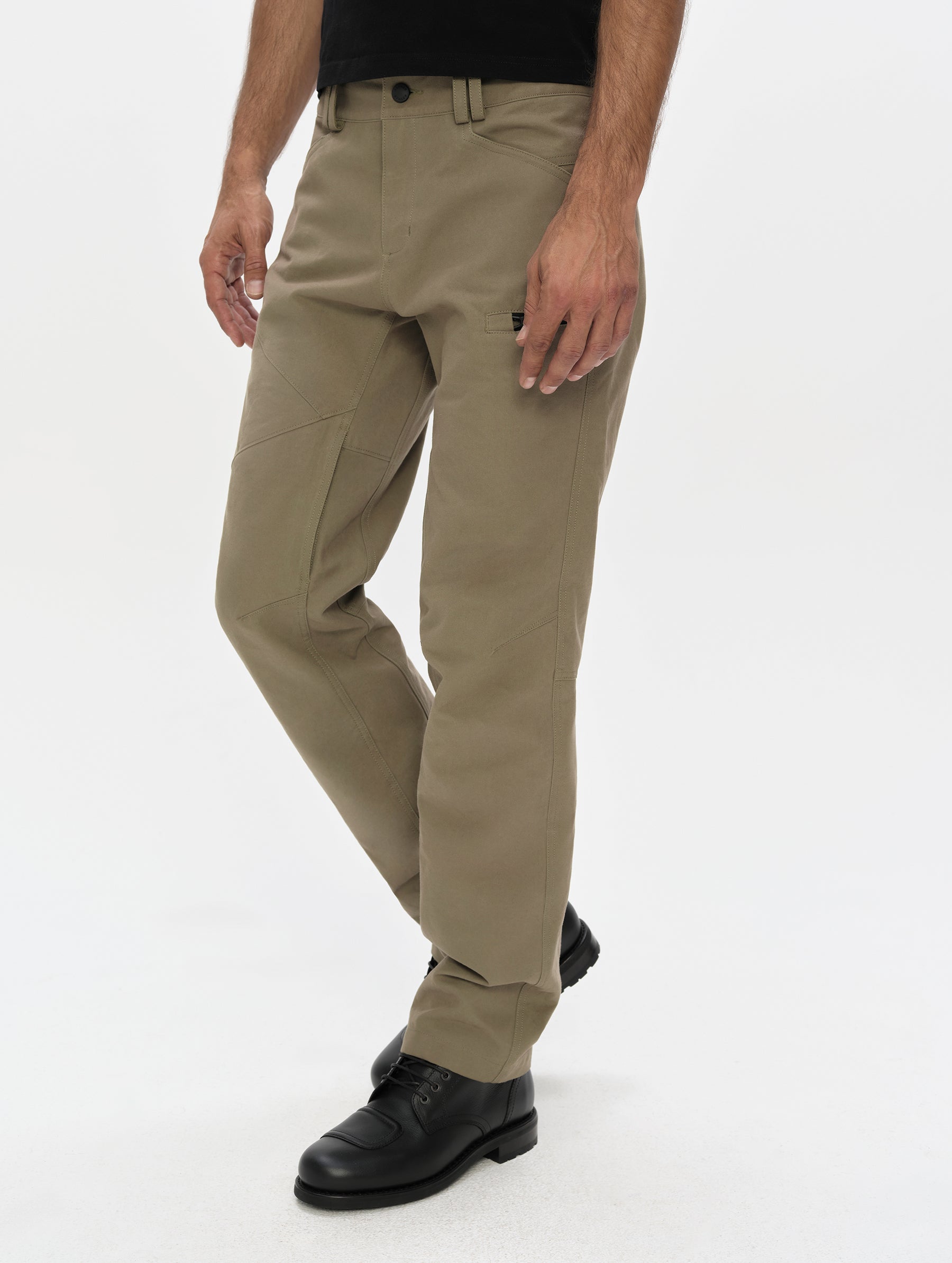 Front, 3/4, lower-body view of man wearing the Mojave Motorcycle Pant 2.0 in Stone Brown from AETHER Apparel.